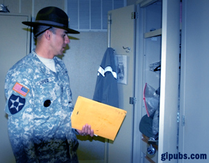 Drill sergeant inspects a locker